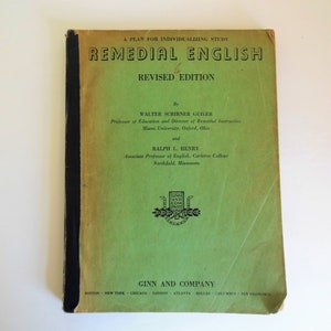 May include: A green book titled "Remedial English" with a black spine. The book is a revised edition by Walter Schriener Guiler and Ralph L. Henry. The book is published by Ginn and Company.