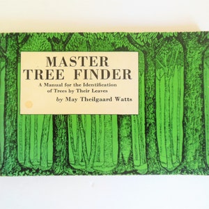 May include: A green book cover with a black and white illustration of trees. The title is "MASTER TREE FINDER" and the subtitle is "A Manual for the Identification of Trees by Their Leaves" by May Theilgaard Watts.