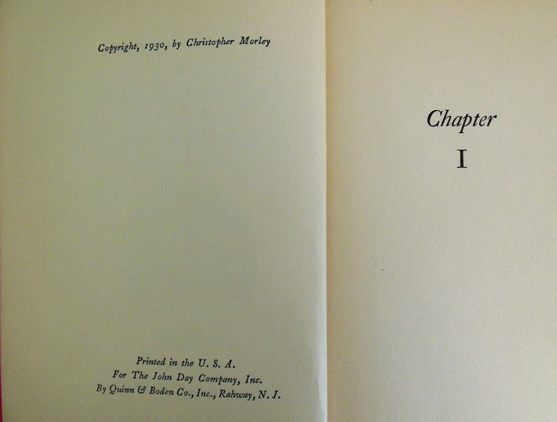 May include: A book with the title "Chapter I" on the right page and copyright information on the left page. The copyright information includes the year 1930 and the author Christopher Morley.