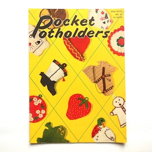 May include: A vintage booklet with a yellow background and a title that reads "Pocket Potholders". The cover features a variety of colorful crocheted potholders in the shapes of a boot, a strawberry, a duck, a gingerbread man, a frog, a sombrero, a horse, and a flower.