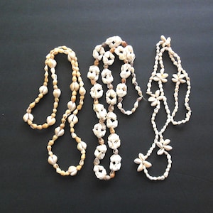 Three Seashell Necklaces Vintage Lot of Strung Shells, Long Strands made with Conch Cowrie Trumpet, Hawaiian Souvenir