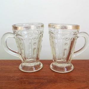 Jewel With Dewdrop Mugs Two U S Glass Kansas State Series Antique Glasses, EAPG Little Handled Cups with Gold Trim, Sold as Is