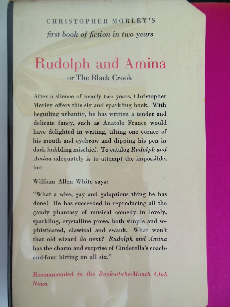 May include: A book cover with the title "Rudolph and Amina or The Black Crook" by Christopher Morley. The cover is white with black text and a quote from William Allen White.