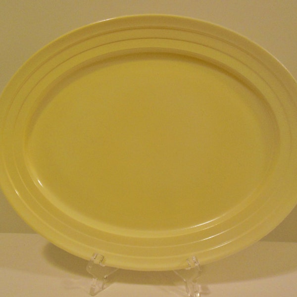 Hazel Atlas Moderntone Platonite, Oval Yellow Ribbed Serving Platter, on White Milk Glass