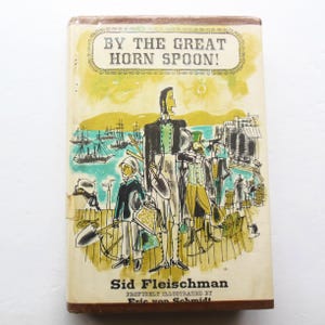 May include: Vintage book cover for "By the Great Horn Spoon!" featuring an illustration of several figures on a pier, with ships in the background. The cover has a yellow and green color scheme with the author's name, Sid Fleischman, and the illustrator's name, Eric von Schmidt.