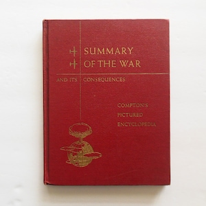 May include: A red hardcover book with gold lettering titled "Summary of the War and Its Consequences." The book is from Compton's Pictured Encyclopedia and features a gold illustration of a globe with a mushroom cloud above it.