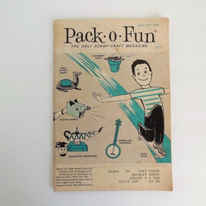 May include: A vintage "Pack-O-Fun" magazine from June-July 1965. The cover features a cartoon illustration of a boy on a skateboard, along with craft ideas like puppets and a graduation centerpiece. The magazine is tan with black and teal accents.