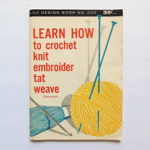 May include: A vintage Lily Design Book No. 206 with a cream cover featuring red text that reads LEARN HOW to crochet knit embroider tat weave (Swedish). The cover displays a yellow yarn ball with blue knitting needles and a blue crochet hook.
