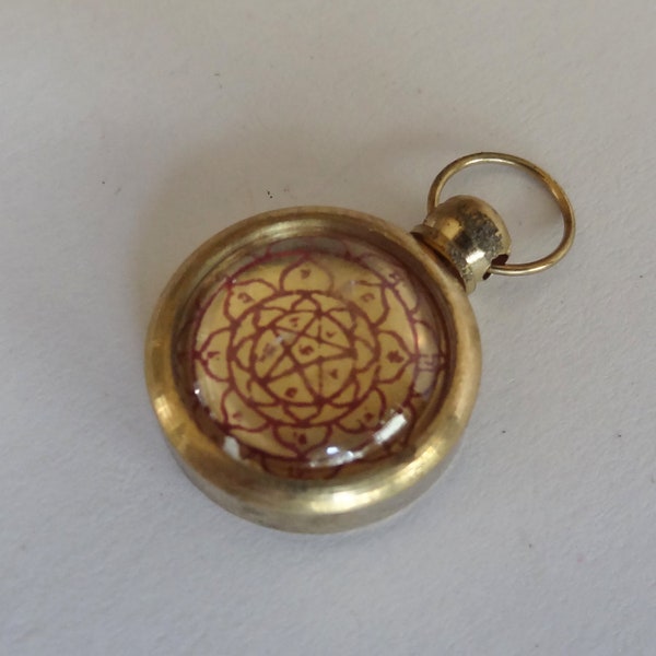 Pendant with Yantra diagram design