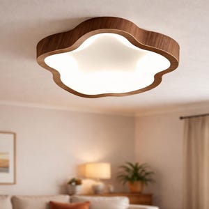 May include: A white ceramic mug with a black handle and the text "But First, Coffee" in a handwritten style. The mug is on a white surface. The mug is approximately 4 inches tall.