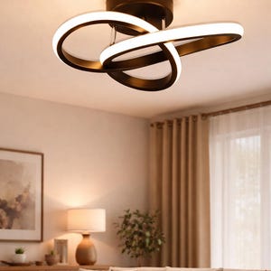 Plafoniera moderna nera con LED a luce bianca calda per interni.