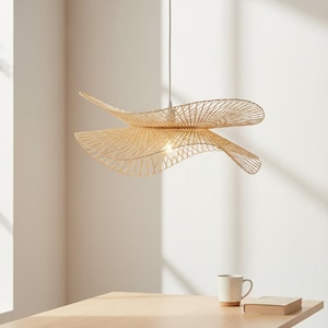 May include: A set of three ceramic vases in varying heights and shapes. The vases are glazed in a matte white finish, offering a minimalist aesthetic. The tallest vase is approximately 10 inches high.