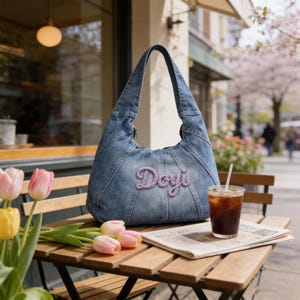 May include: A set of three ceramic mugs with a speckled, matte finish. Each mug features a different color: light blue, cream, and gray. The mugs have a simple, modern design, perfect for coffee or tea.