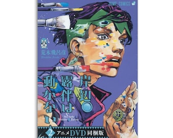 Op de afbeelding: Een manga-volume met een kleurrijke illustratie van een persoon met verfspatten op hun gezicht en haar. De cover heeft Japanse tekst en de woorden "JUMP COMICS". Bovenaan zijn penselen afgebeeld, met een paarse en blauwe achtergrond.