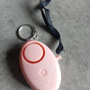 130dB Persönlicher Sicherheit Alarm Schlüsselanhänger mit LED-Licht, Notfall Selbstverteidigung Sirene (Pink & Mint)