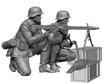 May include: A grayscale sculpture of two soldiers in military uniforms, kneeling and operating a machine gun. The gun is mounted on a tripod, with ammunition boxes nearby. The soldiers wear helmets and carry equipment.