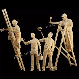 May include: A wooden sculpture of four figures in work clothes, each holding painting tools. Two figures are on ladders, one using a paint sprayer, another a brush. The other two figures are standing, one with a paint roller and the other with a brush.