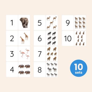 May include: A set of ten educational cards featuring numbers one through ten paired with corresponding illustrations of African wildlife, including elephants, giraffes, flamingos, hippos, gazelles, wildebeests, lions, zebras, and meerkats.