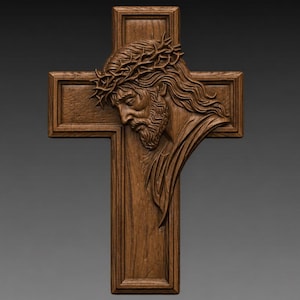 May include: A wooden cross with a carved image of Jesus wearing a crown of thorns. The cross is made of dark brown wood and has a detailed relief carving of Jesus's face and upper body. The background is a solid gray.