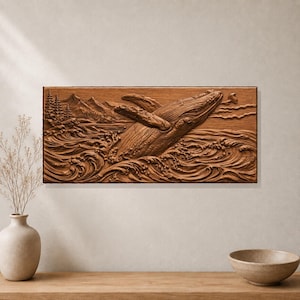 May include: A rectangular wooden wall plaque featuring a detailed relief carving of a humpback whale breaching from ocean waves. The scene includes a mountainous landscape with pine trees in the background, all rendered in a natural brown wood tone.