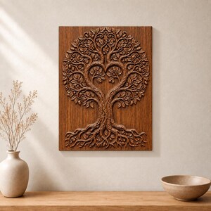 May include: A rectangular wooden wall plaque featuring a detailed relief carving of a tree. The branches of the tree curve inward to form a heart shape in the centre, surrounded by intricate leaves and small acorns, with visible roots at the base.