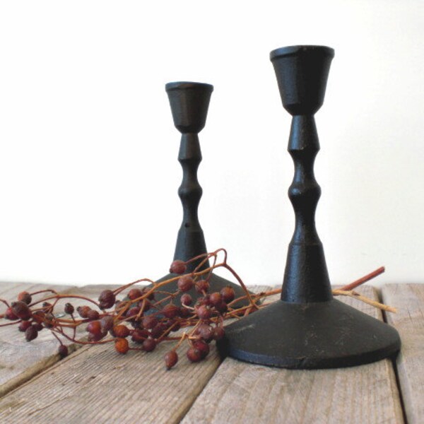 Vintage cast iron candle holders. Rustic farmhouse style. Simple beauty.