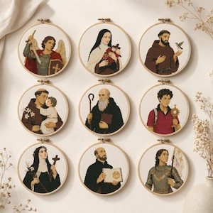 May include: Nine circular wooden embroidery hoops containing cross-stitch portraits of religious figures. The figures include an angel with a sword, a nun with roses, a monk with a bird, a monk holding a child, a bearded monk, a young person with a monstrance, a nun with a cross, a monk with a book, and a person in armour with a flag.