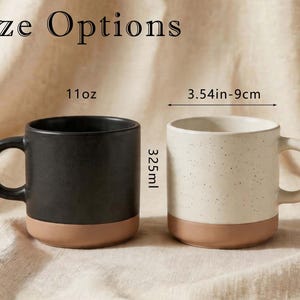 May include: Two ceramic mugs with handles, one matte black and one speckled off-white, both featuring a solid terracotta base. Text reads Size Options, 11oz, 325ml, 3.54in-9cm, and 3.75in-9.5cm, indicating dimensions for these cylindrical vessels.