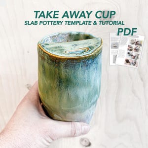 May include: A handmade ceramic take away cup with a unique glaze in shades of green and blue. The cup is held in a hand, showcasing its form and texture. The text "TAKE AWAY CUP" and "SLAB POTTERY TEMPLATE & TUTORIAL" are visible.