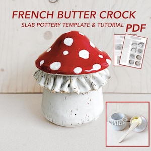 May include: A ceramic French butter crock with a red mushroom-shaped lid with white spots. The crock has a white base with a ruffled edge. The image includes the text "FRENCH BUTTER CROCK" and "SLAB POTTERY TEMPLATE & TUTORIAL PDF".