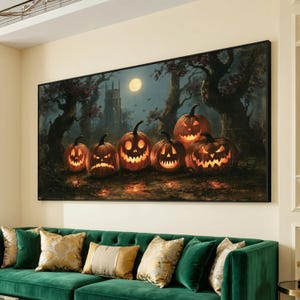 May include: A rectangular wall art print featuring five glowing jack-o'-lanterns in a dark, wooded landscape at night. A full moon illuminates a distant stone tower, while the carved pumpkins cast a warm orange light on the ground.