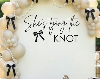 She's Tying the Knot Decal for Bridal Shower Backdrop Sign Bridal Shower Vinyl Decal Tying the knot Bow Themed Shower for Bride Pink Shower