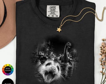 Opossum Dinosaur City Shirt: Night Scene Graphic Tee