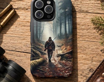 May include: A smartphone case featuring a printed graphic of a person walking through a forest with a rifle and a dog. The case is surrounded by a wooden-stock rifle, two brass cartridges, olive green binoculars, a knife in a leather sheath, and a cap.
