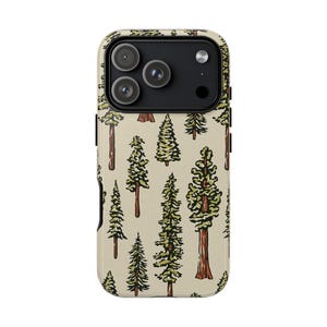 May include: A phone case featuring a repeating pattern of green and brown trees on a beige background. The case has a camera cutout with three lenses and a flash. The trees vary in size and style, with detailed green foliage and brown trunks.