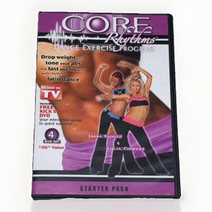Op de afbeelding: Een dvd-hoes voor het "Core Rhythms Dance Exercise Program". De cover toont twee vrouwen in sportkleding, met tekst die gewichtsverlies en buikspiertraining via Latijns-Amerikaanse dans promoot. Inclusief een gratis kickstart-dvd.