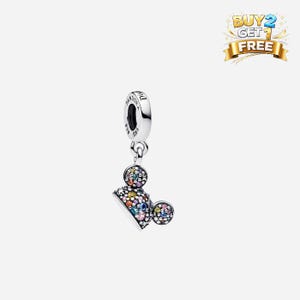 May include: A silver charm featuring a Mickey Mouse hat design, embellished with colourful gemstones. The charm has a loop for attaching to a bracelet or necklace. The image also includes a "Buy 2 Get 1 Free" banner.
