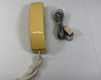 Klasyczny kremowy telefon Unisonic Slim Line Model 6750 z dużymi numerami i datą 1996-08