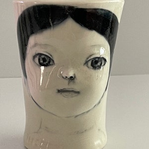 Handmade porcelain face cup