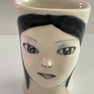Handmade porcelain face cup