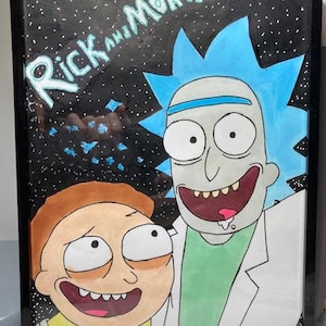 May include: Framed artwork featuring the animated characters Rick and Morty. The artwork depicts Rick with blue spiky hair and Morty with brown hair. The background is black with white and blue accents, and the words "Rick and Morty" are written in white.