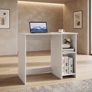 May include: A white desk featuring a flat rectangular top and two open storage shelves on the right side. The desk holds a laptop displaying a mountain landscape, a white mug, a white vase with flowers, and several books on the lower shelf.