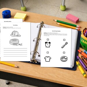 May include: A three-ring binder containing educational activity sheets with black and white line drawings. The sheets feature titles like My Healthy Habits, Fire Safety, and My Morning Checklist, accompanied by illustrations of a helmet, hose, clock, and toothbrush.