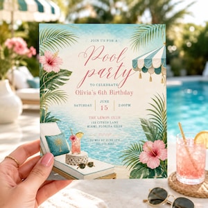 May include: A rectangular pool party invitation card featuring pink hibiscus flowers, green palm leaves, a blue and white striped cabana, and a lounge chair. The text reads: Join us for a Pool party to celebrate Olivia's 6th Birthday, June 15, 2:00PM.