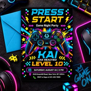 May include: A rectangular party invitation featuring a black background with neon blue, pink, and yellow graphics. The text reads PRESS START, Game Night Party, KAI HAS REACHED LEVEL 10, Saturday, August 16 at 3 PM, 245 Greenhill Road, New York, NY 10514.