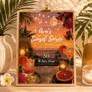 May include: A rectangular invitation card held by a gold clip, featuring a sunset beach scene with palm trees, string lights, and a full moon. Text reads: You're invited to Ava's Sunset Soirée, August 30, 7 PM, The Palms Terrace, 901 Ocean Drive, Miami Beach, FL.