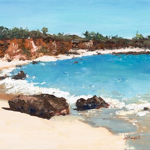 May include: An oil painting of a coastal scene featuring a sandy beach with dark brown rocks in the foreground, vibrant turquoise water with white crashing waves, and a reddish-brown cliff line under a clear blue sky. Signed Jo Munsell.