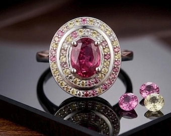 Anillo Art Déco de plata con rubí y zafiros multicolores.