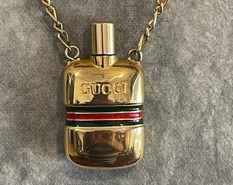 Gucci perfume pendant