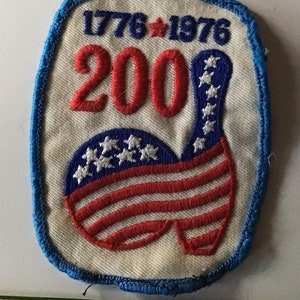 Previously used 1976 bowling patch commemorating the USA bicentennial and a 200+ game being bowled.